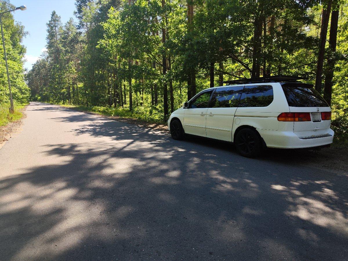 Honda Odyssey rear view with camping gear and winter camping setup